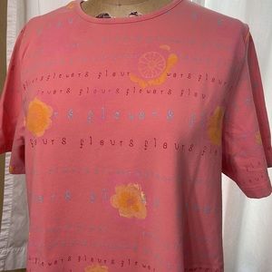 C.J. Banks, peach colored, short sleeve tee shirt, citrus and floral design